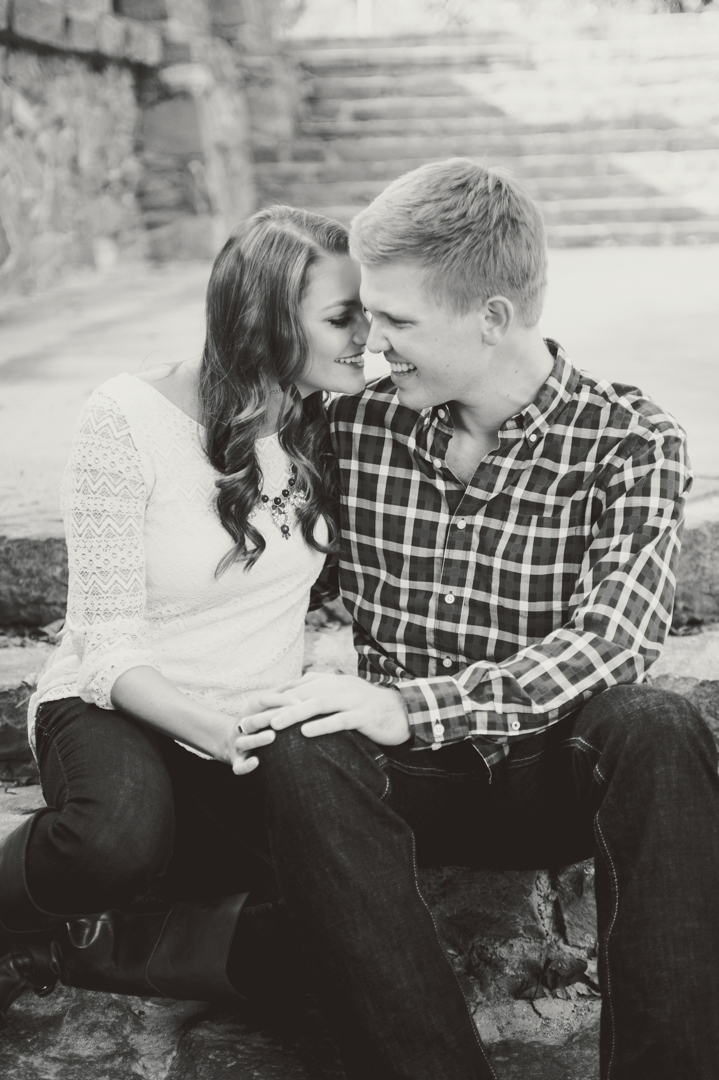 couple kissing on steps at piedmont park