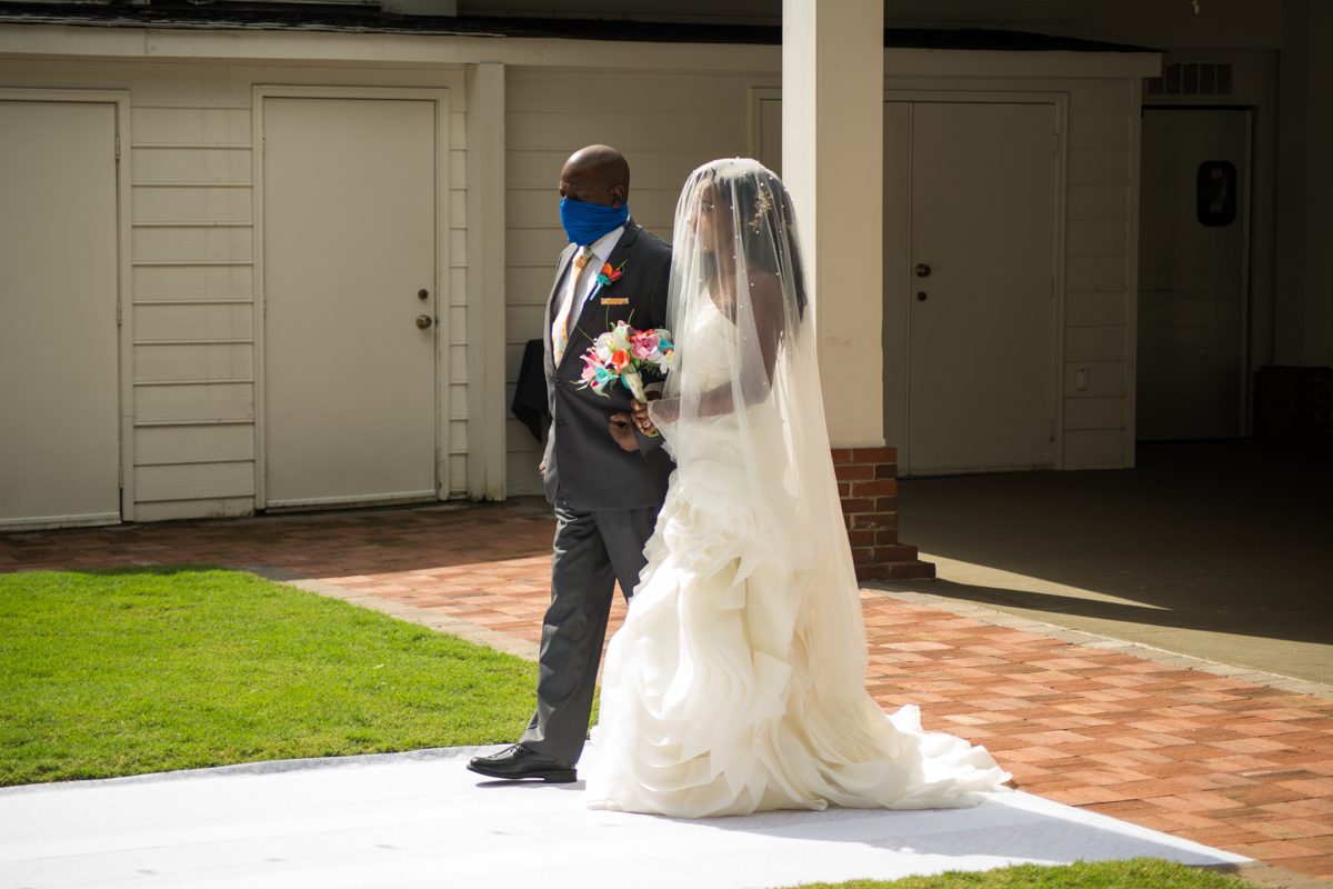 bride walks down aisle with dad during Garden Wedding Near Atlanta, GA