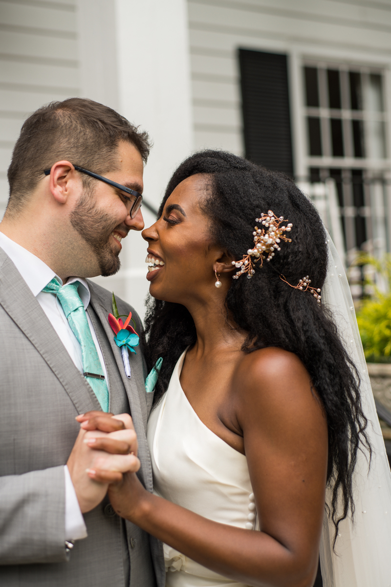 newlyweds laugh together after Garden Wedding Near Atlanta, GA