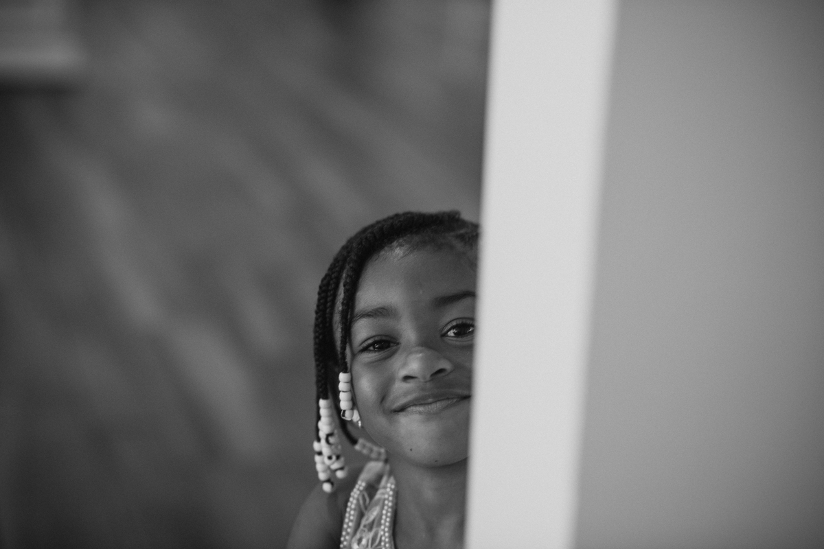 flower girl watches reception dances