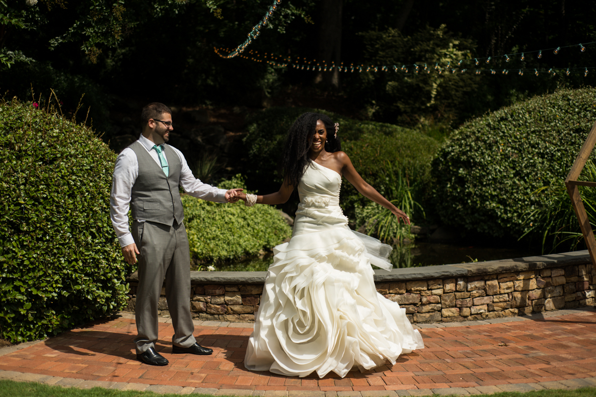 bride and groom dance in Atlanta garden